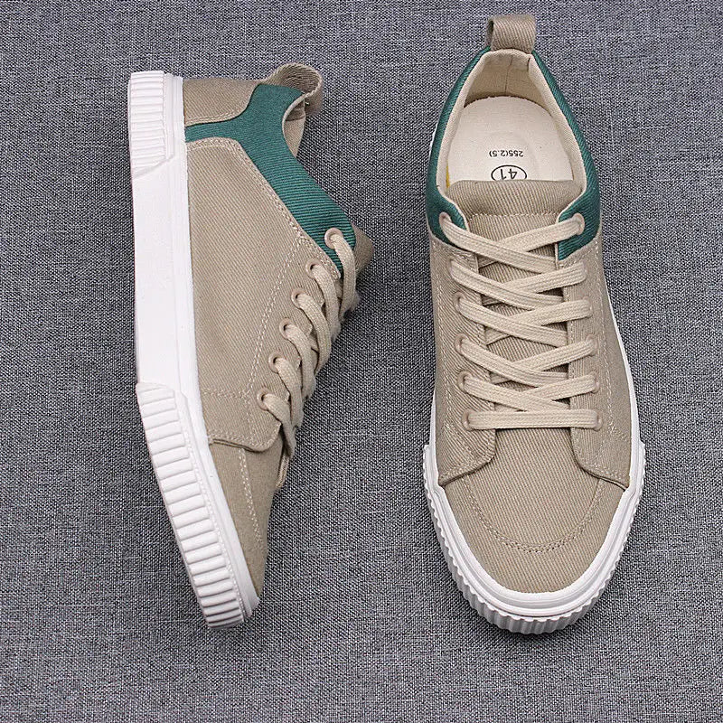 Men Spring Canvas Shoes New Breathable Lace Up Casual Men Versatile Flat Bottomed Cloth Shoes Anti Skateboard Shoes Tennis