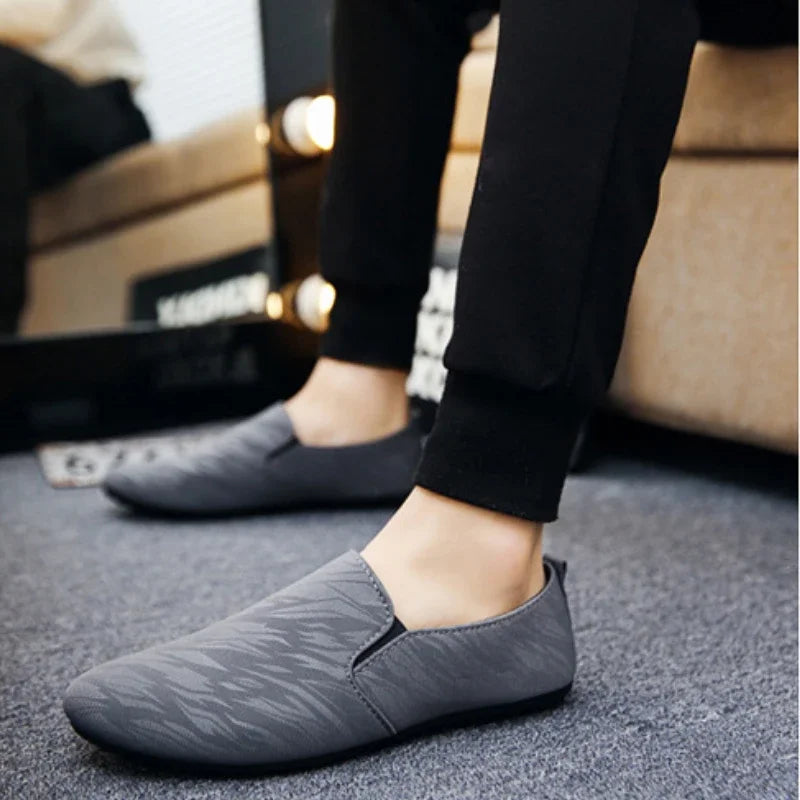 Men Flat Casual Loafers Trend Slip on Sport Shoes Fashion Light Breathable Solid Color Walking Shoes Zapatillas Hombre